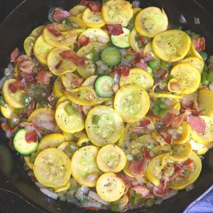 sauteed zucchini and summer squash in cast iron skillet