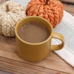yellow coffee cup with homemade pumpkin spice latte
