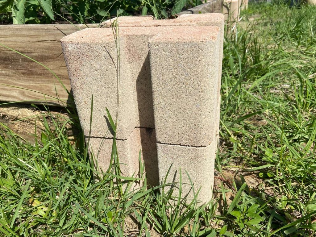 two oldcastle cinder blocks used for raised bed gardens stacked on top of each other