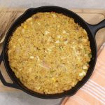 traditional cornbread dressing in a cast iron skillet