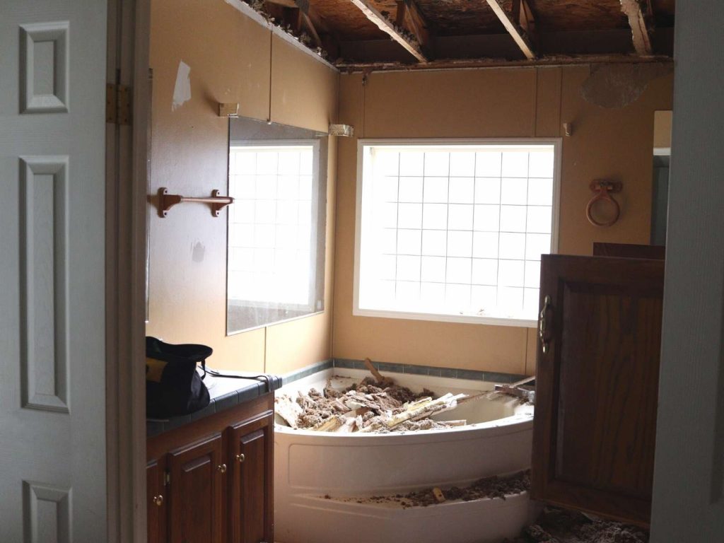 master bathroom with ceiling ripped out