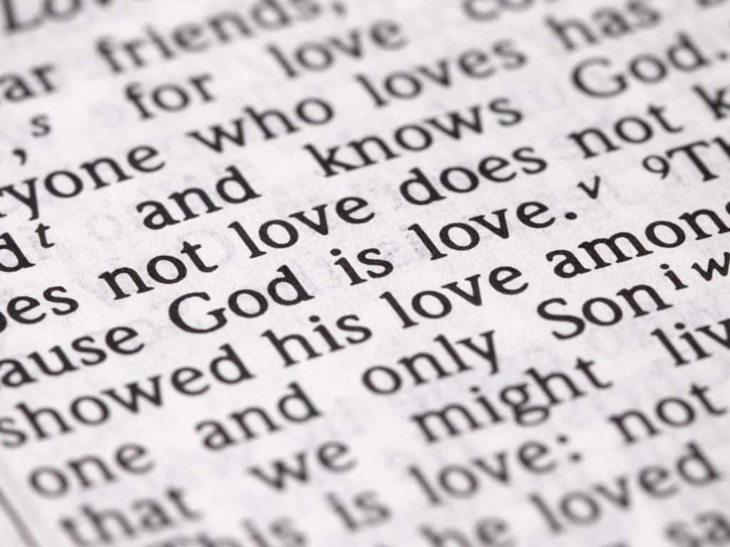 up close view of Bible verse stating that God is Love