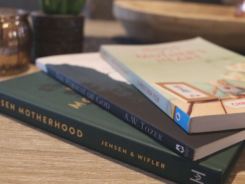 3 Christian motherhood books sitting on table