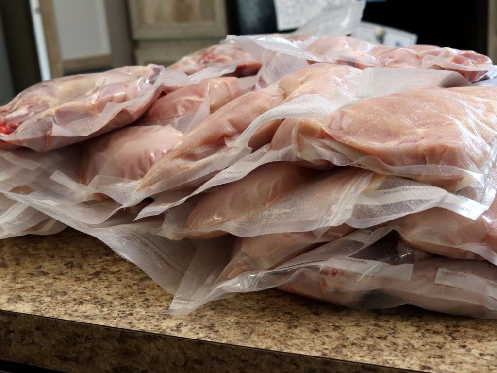 chicken meat in plastic bags