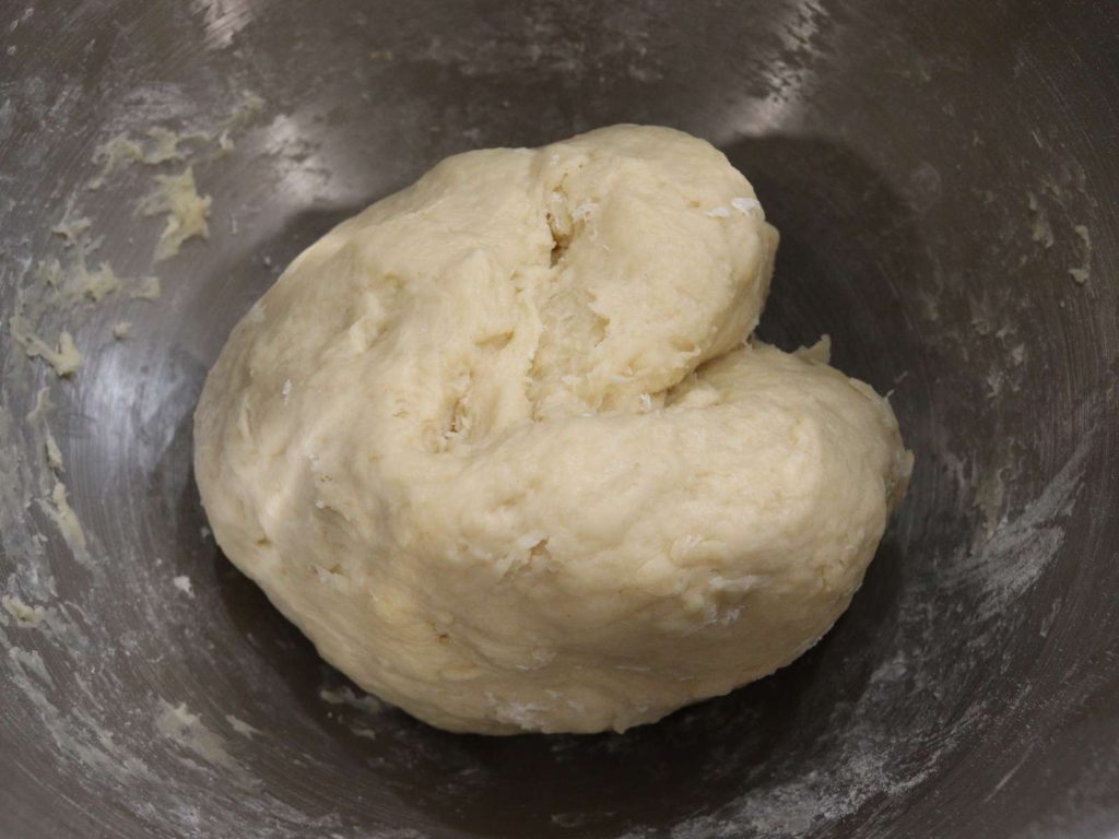 chicken and dumpling dough in mixing bowl