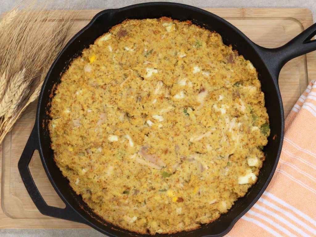 southern cornbread dressing in a cast iron skillet