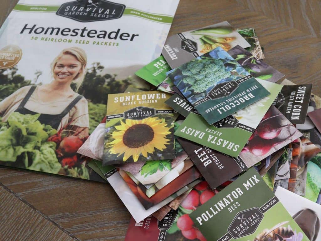 Mylar bag with homesteader on the front of it that various seed packages 