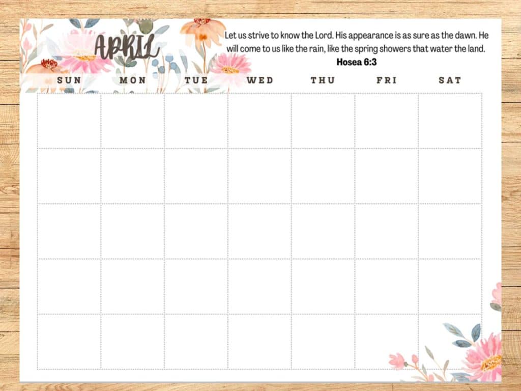 undated monthly calendar with Bible verse with floral design on wooden backdrop