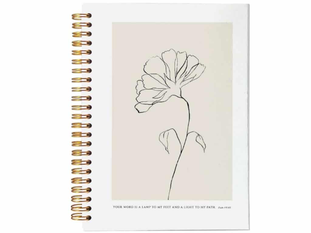 spiral notebook with sketch of flower