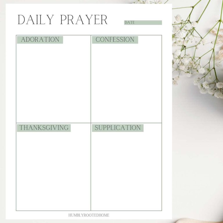 ACTS prayer model worksheet on white table with flowers