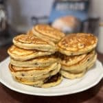 stack of chocolate chip pancakes on white plate