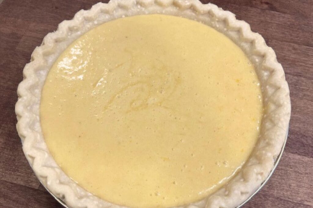 buttermilk pie filling in unbaked pie shell