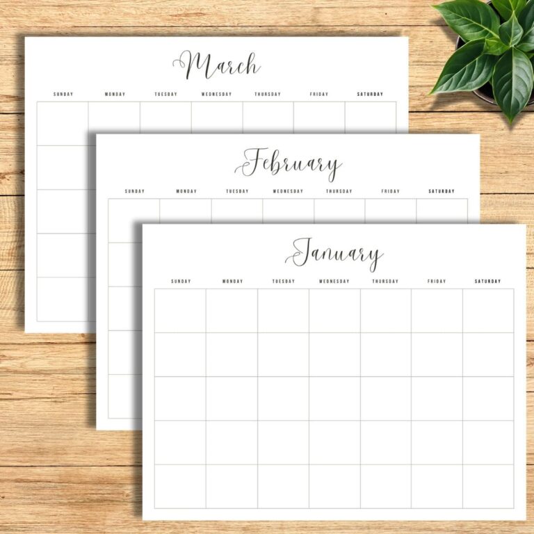 free undated monthly calendar printables sitting on a light wood surface