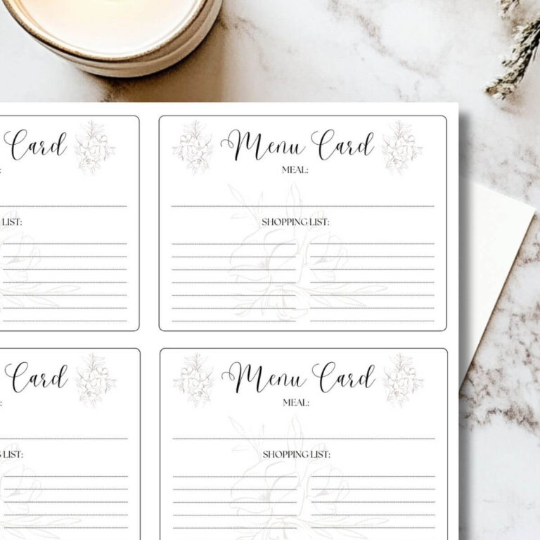 printable menu cards sitting on a marble tabletop